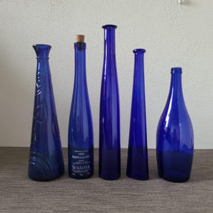 Vintage blue (wine) bottles | decorative narrow vases | blue solar water | bottle with new cork
