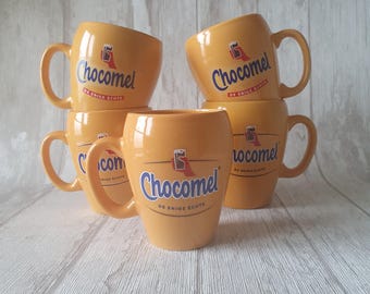 Gobelets ou mugs jaunes Chocomel Nutricia avec oreille pour lait au chocolat | Voir les photos pour différentes variantes