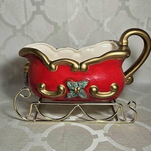 Vintage Ceramic Christmas Sleigh Server Decorative Container with Brass Stand.