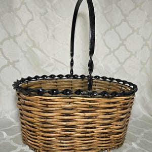 Twisted Metal Accent Wicker 13&quot; Basket. Oval Twisted Iton Accent Wicker Basket.