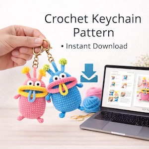 May include: Two crochet monster keychains, one pink and one blue, with yellow and green accents. The keychains have open mouths with tongues sticking out. The image also shows a laptop with a pattern and the text "Crochet Keychain Pattern - Instant Download."