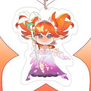 May include: A decorative tag featuring a cartoon fairy with orange hair and a white and purple dress. The tag has a butterfly shape with a gradient of orange and pink. A round charm with an orange flower design hangs below.