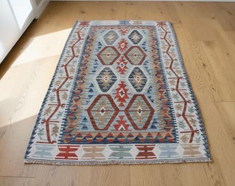 Alfombra Kilim geométrica turca vintage: alfombra bohemia tejida a mano (1,1 x 2 m)