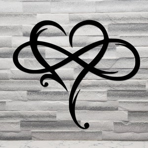 May include: Black metal infinity symbol design in the shape of a heart. The design is intricate and detailed, with a flowing, continuous line.