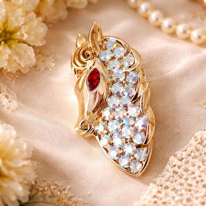 Vintage Coro Pegasus Brooch: AB Rhinestones, Ruby Eye