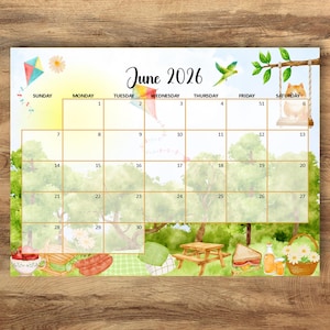 May include: A watercolor-style calendar for June 2026, featuring a picnic theme. The calendar includes illustrations of a kite, a bird, a cat on a swing, and picnic food. The background shows a park scene with trees and a picnic table.