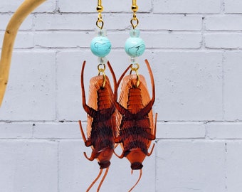 Adopt-a-Roach - 'Paul & Paula' Cockroach Earrings. Quirky Cockroach Earrings – Unique Accessories with Vibrant Blue Beads!