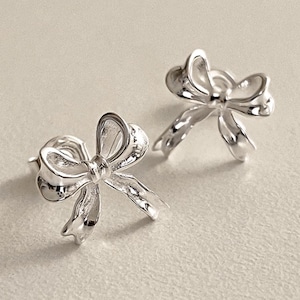 Sterling silver ribbon bow stud earrings