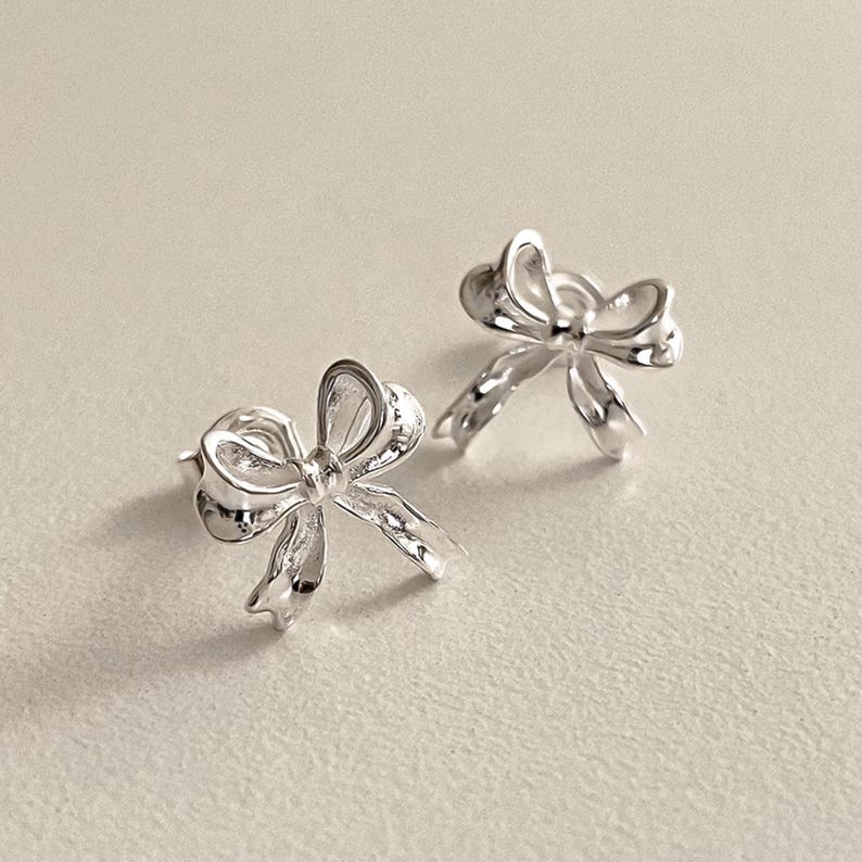 Sterling silver ribbon bow stud earrings