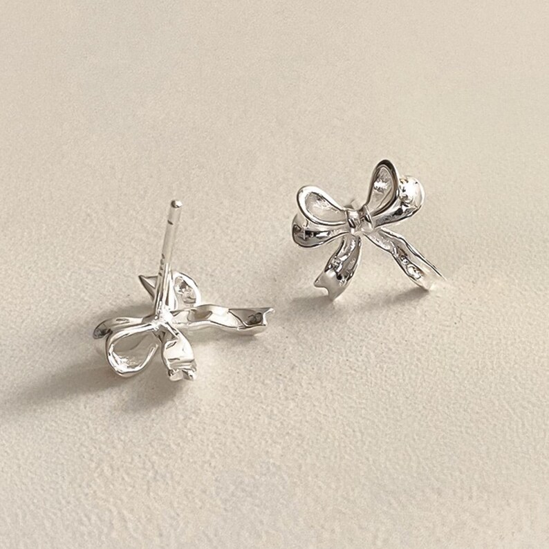 Romantic silver ribbon earrings