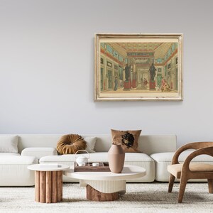 May include: A framed print of a vintage illustration depicting an interior scene of a grand hall with columns, arches, and statues. The hall is decorated with red and green accents, and the floor is tiled. The print is in a light wood frame.