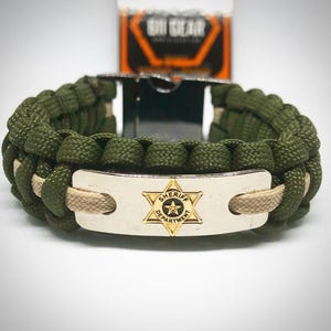 Sheriff Dept / Deputy Sheriff Badge Paracord Bracelet - OD Green with a Khaki stripe Paracord Survival Bracelet.