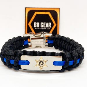 Sheriff Dept Badge Thin Blue line Paracord Bracelet - Black with a Blue stripe