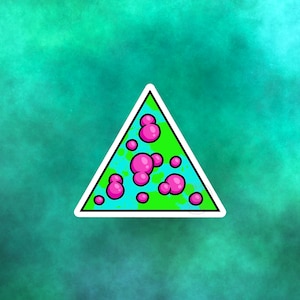 May include: A green triangle sticker with pink circles inside. The circles are of different sizes and are scattered throughout the triangle.