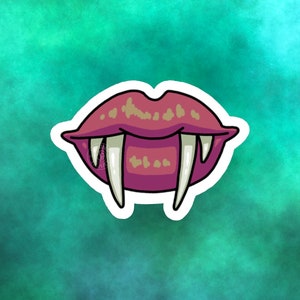 May include: A sticker depicting cartoon lips with large fangs. The lips are a deep magenta, outlined in black, with white fangs. The background is a gradient of teal and green.