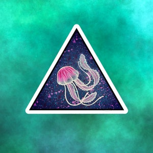 May include: A pink and white jellyfish with long tentacles is depicted inside a white triangle on a green background with a galaxy-like pattern.
