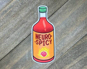 May include: A sticker of a red hot sauce bottle with a yellow label that says "Neuro-Spicy". The label also features a brain on fire.