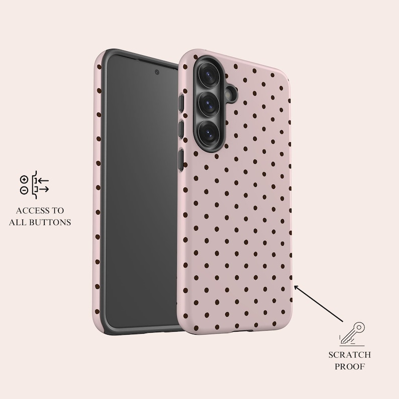 May include: A pink phone case with a repeating pattern of small brown polka dots. The phone case is shown next to a black smartphone. Text on the image reads "ACCESS TO ALL BUTTONS" and "SCRATCH PROOF".