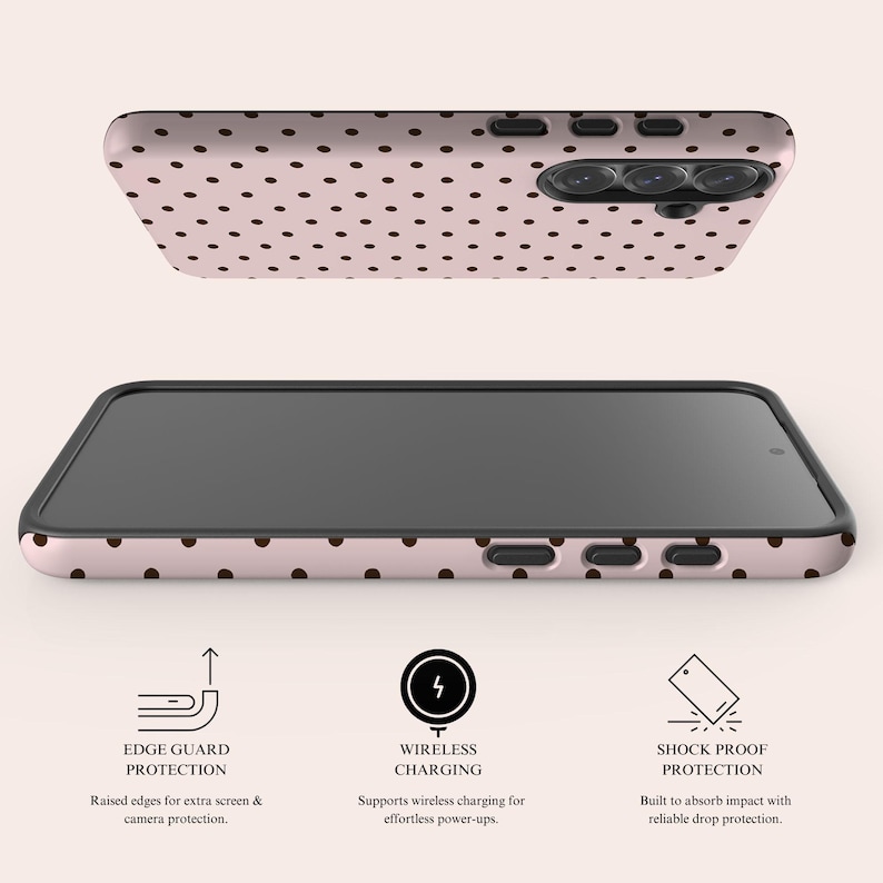May include: A phone case with a pink background and a pattern of small brown polka dots. The case has raised edges for screen and camera protection, supports wireless charging, and is shock-proof. The image shows the phone case from two different angles.