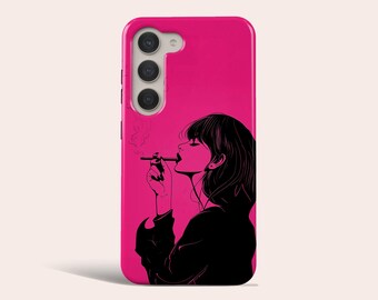 May include: A pink phone case with a black and white illustration of a person smoking a cigarette. The phone case has a triple camera lens.