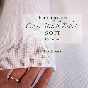May include: White European cross stitch fabric, labeled "SOFT 16 count" and "by ZELE NAVA".