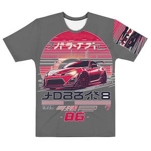 May include: A gray t-shirt with a red and white graphic of a red sports car with the text "ファイナル" and "D88系8" in Japanese. The shirt also has a red and white graphic of a sunset.