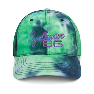May include: A green and blue tie-dye baseball cap with the text "Synthwave 86" embroidered on the front.