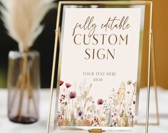May include: A white sign with a gold frame and a floral design at the bottom. The sign says "fully editable CUSTOM SIGN YOUR TEXT HERE 8X10".