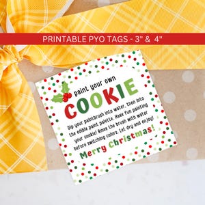 May include: Printable Christmas cookie decorating tags with red, green, and white polka dots. The tags say "paint your own cookie" and "Merry Christmas!"