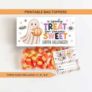 May include: Printable Halloween bag toppers featuring a ghost holding a pumpkin, a spider, and stars. The text reads: A spooky TREAT for someone SWEET HAPPY HALLOWEEN! A clear plastic bag filled with orange, yellow, and white candy corn is included.