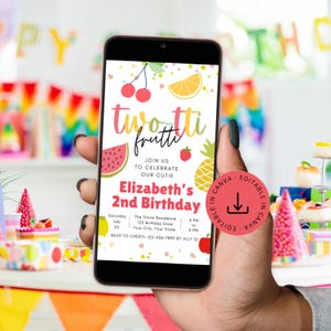 May include: A digital invitation for a 2nd birthday party with a fruit theme. The invitation is on a smartphone screen and features a colorful design with watermelon, pineapple, cherries, and strawberries. The text reads "twontti frutti" and "Elizabeth's 2nd Birthday".