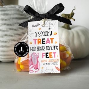 May include: A clear cellophane bag tied with a black bow, filled with candy corn and a Halloween-themed tag. The tag reads "A Spooky Treat for Your Dancing Feet" with a ballet shoe graphic. Includes the text "Happy Halloween! From Stephanie."