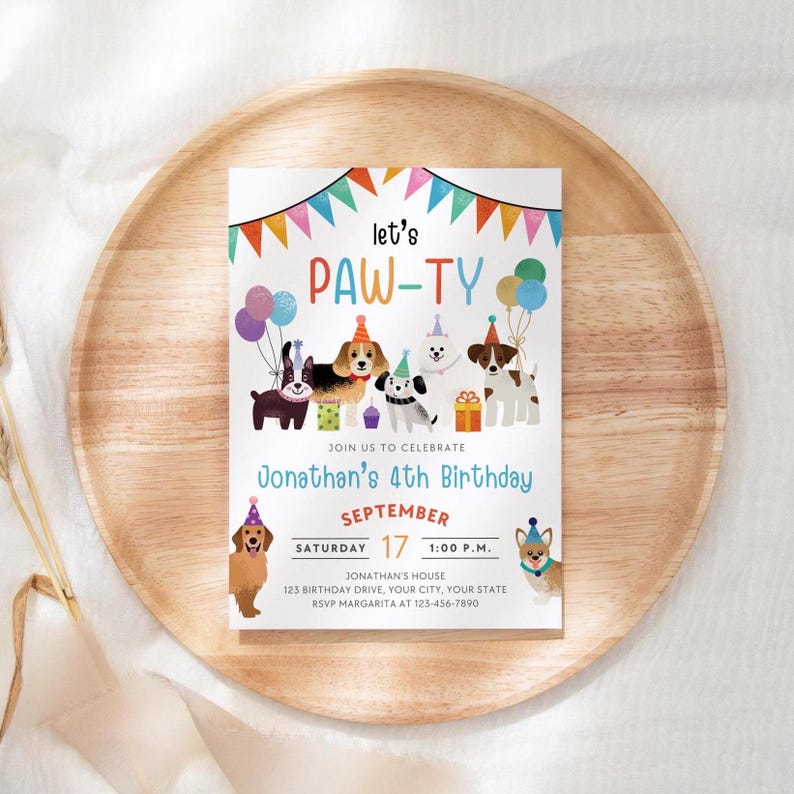 May include: A colorful invitation for a birthday party with a paw print theme. The invitation features a group of cartoon dogs wearing party hats and holding gifts. The text on the invitation reads "Let's Paw-ty" and "Jonathan's 4th Birthday".