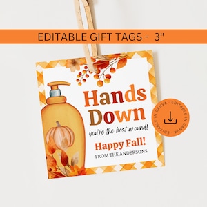 May include: Editable gift tag with a fall theme. The tag features a hand drawn illustration of a bottle of hand soap, a pumpkin, and fall leaves. The text on the tag reads "Hands Down you're the best around! Happy Fall! From the Andersons."