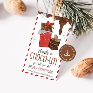 May include: A rectangular Christmas gift tag with a chocolate theme. The tag features a chocolate bar with a red bow, chocolate pieces, and the text "thanks a CHOCO-LOT for all you do! MERRY CHRISTMAS!" with a brown leather string.