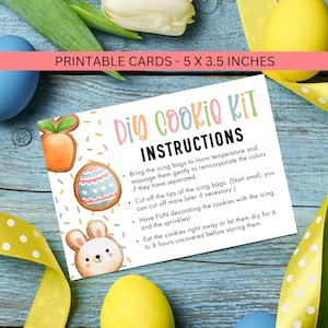 May include: A DIY Cookie Kit instruction card with Easter-themed illustrations of a carrot, decorated egg, and bunny. The card is 5 x 3.5 inches and includes instructions for decorating cookies with icing and sprinkles.