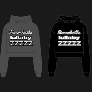 May include: Two hooded sweatshirts, one dark gray and one black, displayed side-by-side. Each features the text "Remember the lullaby" above "ZZZZZ" in a white, stylized font. The sweatshirts have a cropped design.
