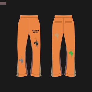 May include: Orange sweatpants with brown and grey side panels. The sweatpants have a black paint splatter design on the left leg and the text "GALLERY DEPT." printed on the left leg.