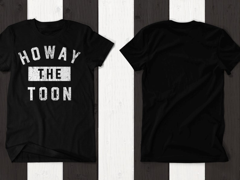 May include: Black t-shirt with a white distressed graphic that says "Howay The Toon".