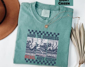 Funny Raccoon Shirt, Mind Ya Business Diesel Ain’t Cheap Tee, Diesel Mechanic Shirt, Trucker Shirt, Sarcastic Crewneck Top