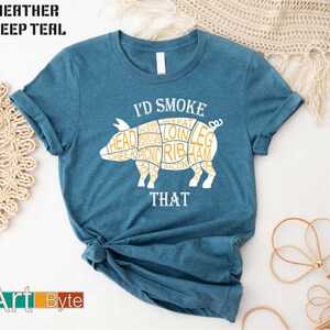 a t - shirt that says i'd smoke that
