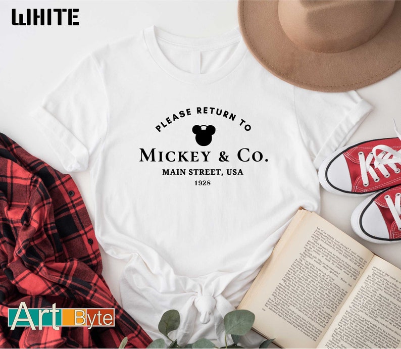 a mickey mouse shirt that says please return to mickey and co
