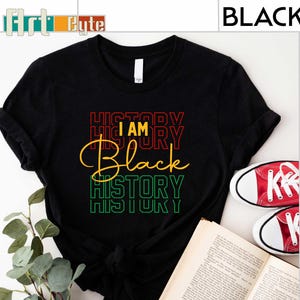 a black t - shirt with the words history printed on it