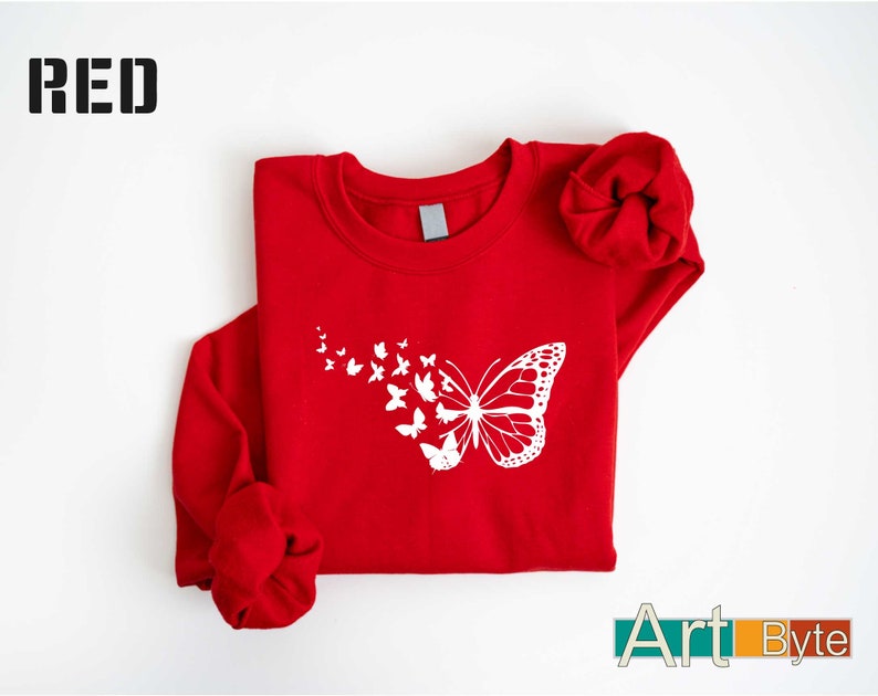 a red shirt with a white butterfly on it