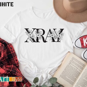 a white shirt with the word krav printed on it