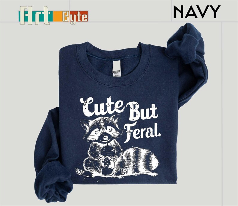 a navy blue shirt with a raccoon on it