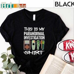 a t - shirt that says this is my paranomial investigation shirt