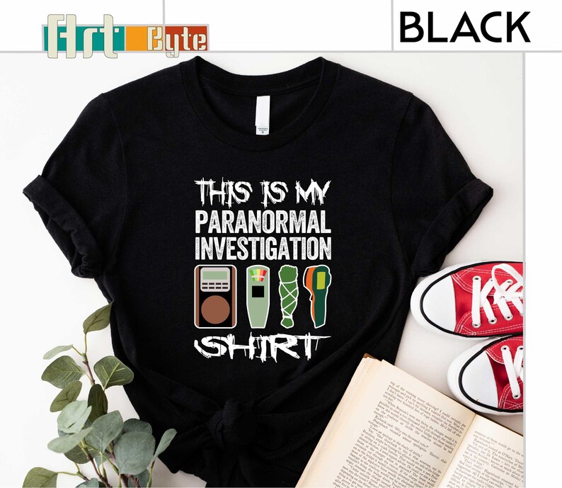 a t - shirt that says this is my paranomial investigation shirt