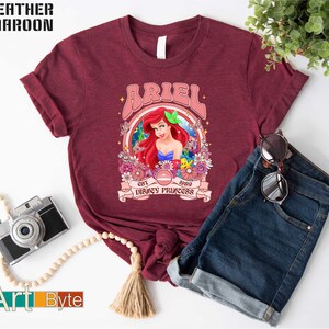 a t - shirt with a picture of ariel from the little mermaid