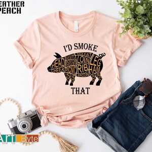 a pink shirt with the words i'd smoke and a pig on it